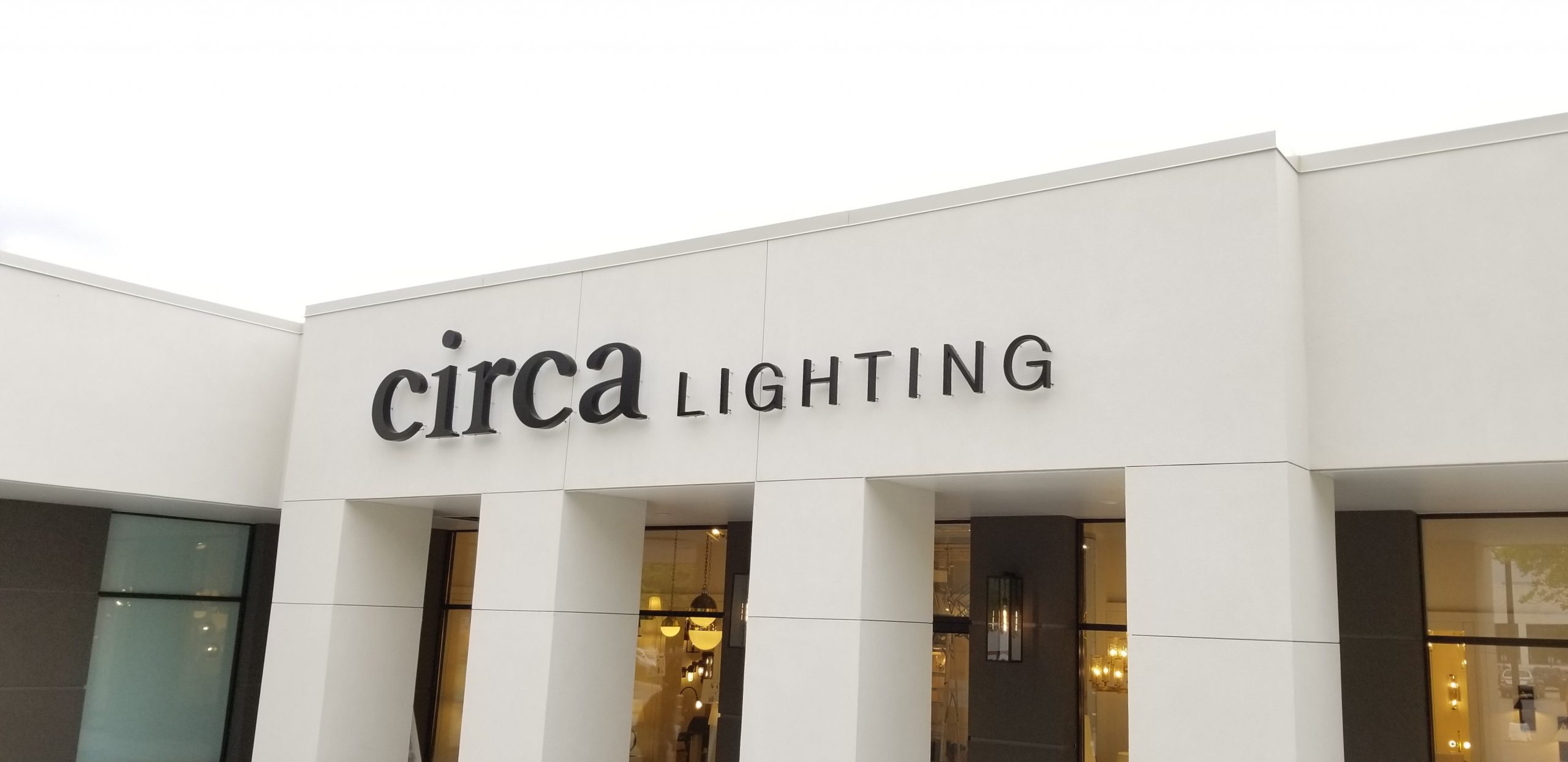 exterior shot of dimensional letters on standoffs on front of building