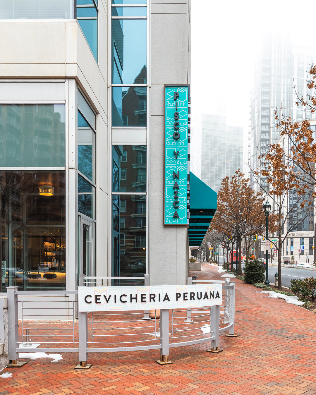 Restaurant exterior signage positioned on building corner for maximum street visibility