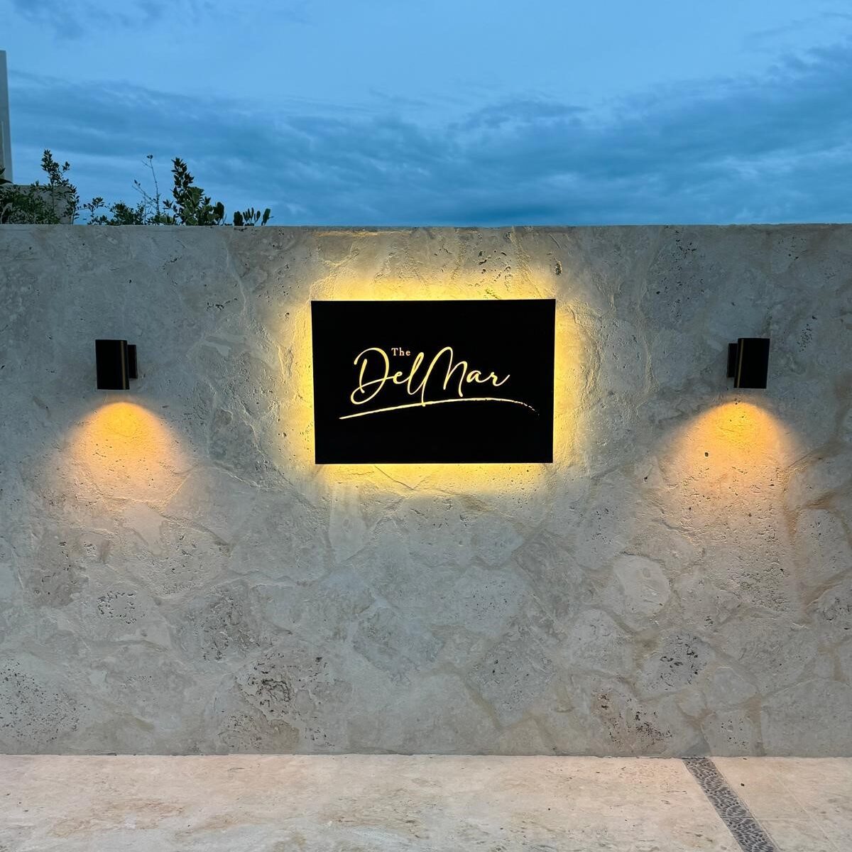 Custom restaurant logo signage installed on exterior facade