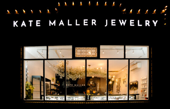 Custom illuminated fabricated letters for Kate Maller Jewelry storefront in Denver, designed and installed by RiNo Sign Works.