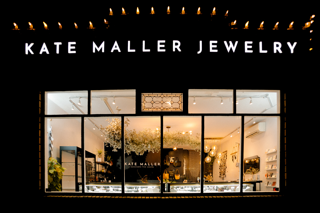 Custom illuminated fabricated letters for Kate Maller Jewelry storefront in Denver, designed and installed by RiNo Sign Works.