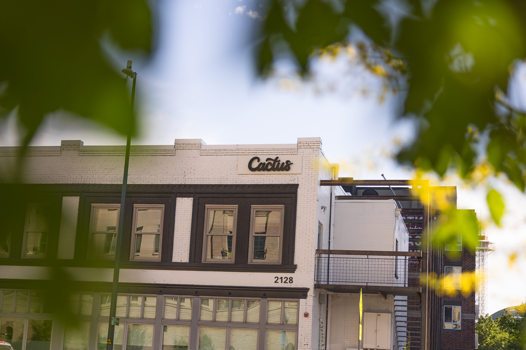 Custom Cactus building signage viewed from 15th Street in Denver